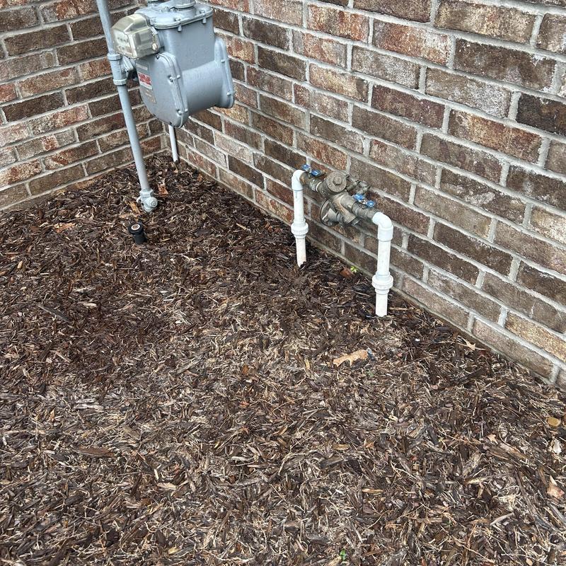 RPC valve piping and gas meter installation outside brick wall