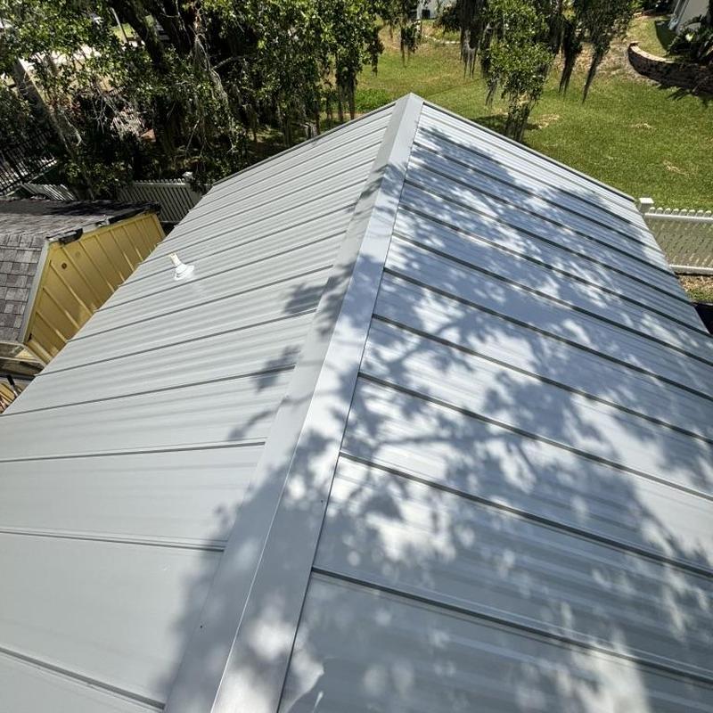 Standing seam metal roof on bungalow top Standing seam metal roof on bungalow top