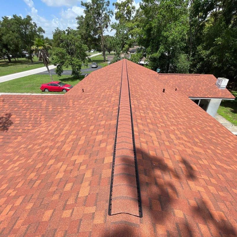 Architectural shingle roof with ridge vent system Architectural shingle roof with ridge vent system
