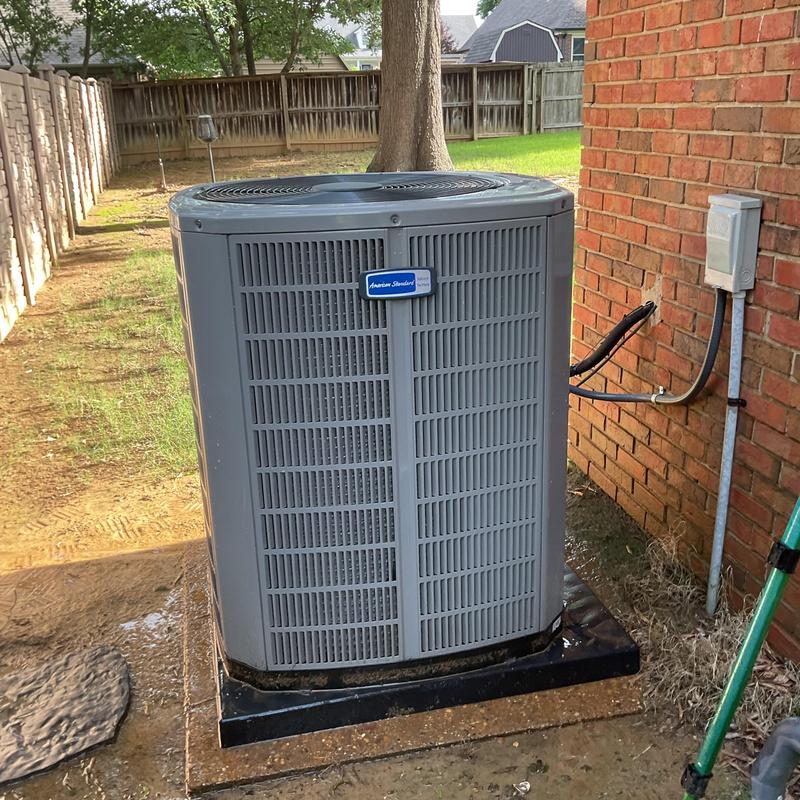 American Standard condenser unit cleaning and inspection outdoors American Standard condenser unit cleaning and inspection outdoors