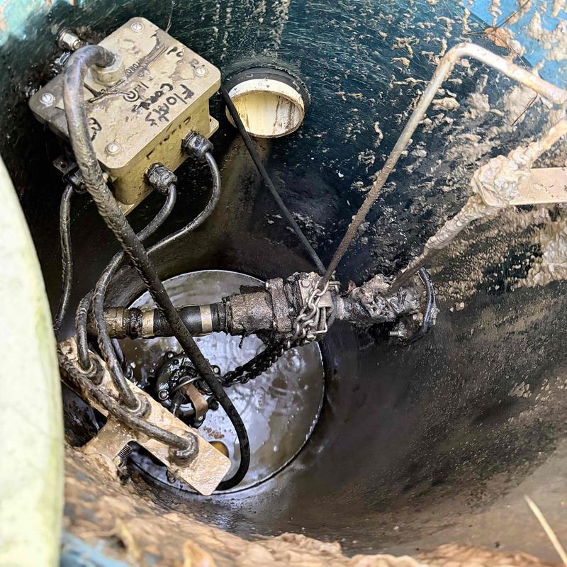 Grinder pump system inside wet well with control box