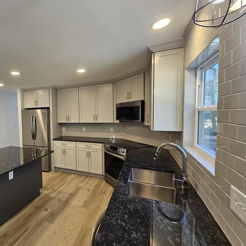 Granite countertop and modern kitchen sink installation Granite countertop and modern kitchen sink installation
