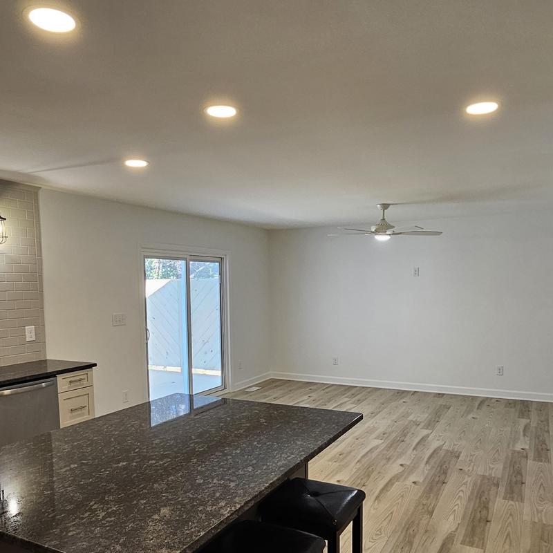 Granite kitchen island with recessed lighting and ceiling fan Granite kitchen island with recessed lighting and ceiling fan