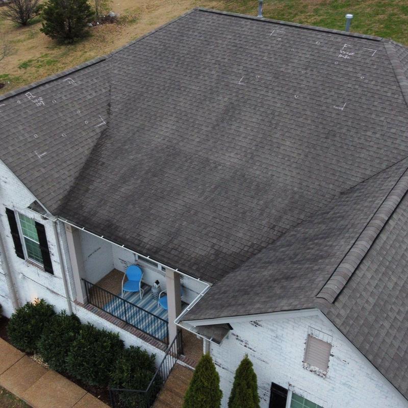 Asphalt shingles roof with hail damage markings