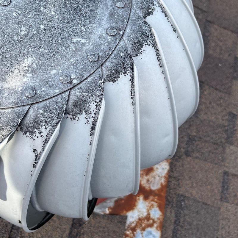 Roof turbine vent with rust and corrosion damage