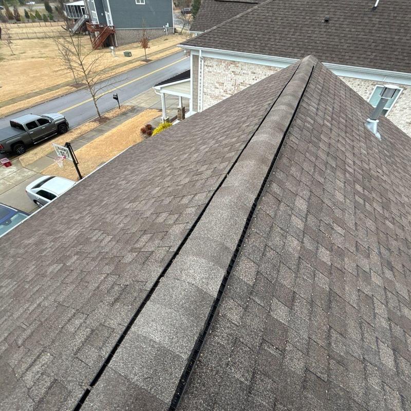 Asphalt shingle roof and ridge vent inspection