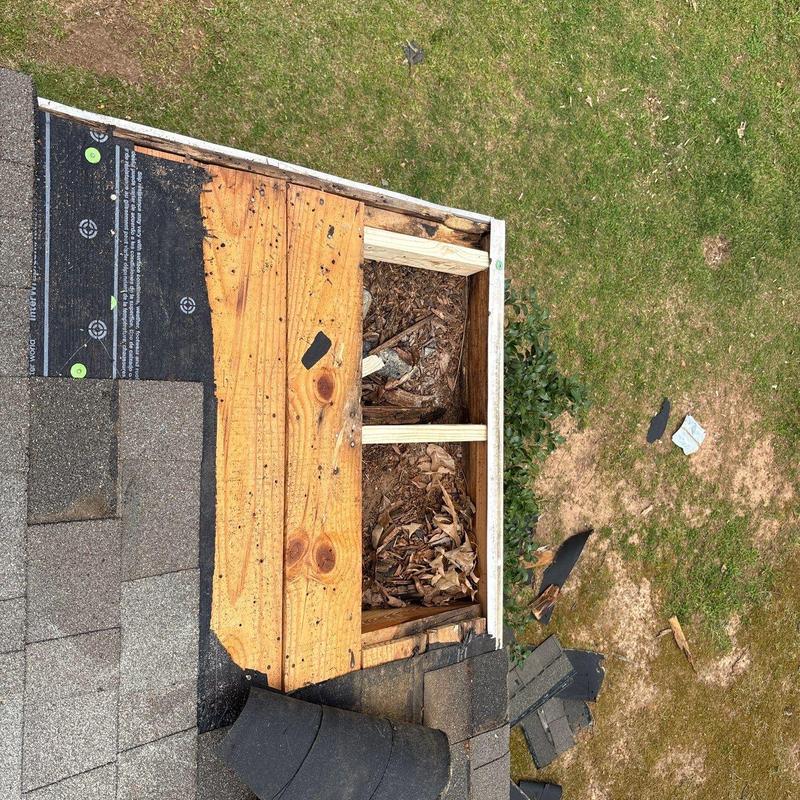 Roof valley wood deck with rot and debris buildup Roof valley wood deck with rot and debris buildup