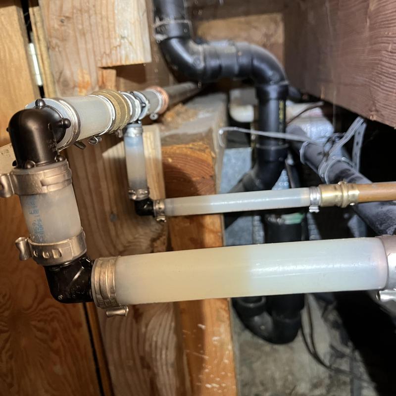 PEX water piping with new ball valve in crawlspace