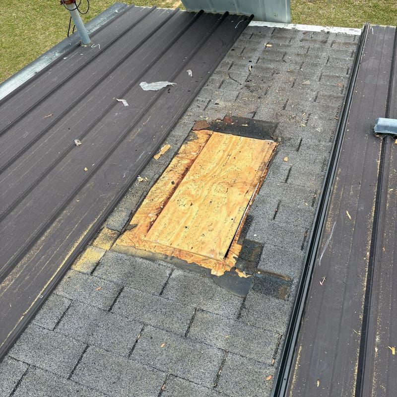 Roof decking with improper patch and damaged shingles Roof decking with improper patch and damaged shingles