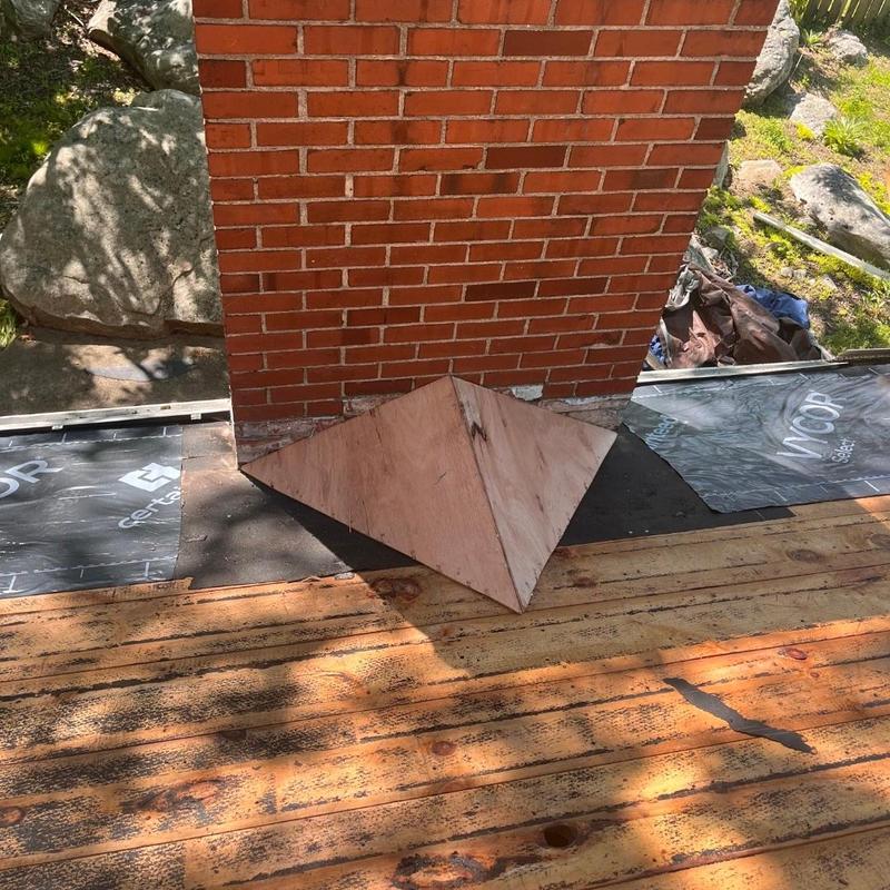 Chimney base roof decking installation with plywood Chimney base roof decking installation with plywood