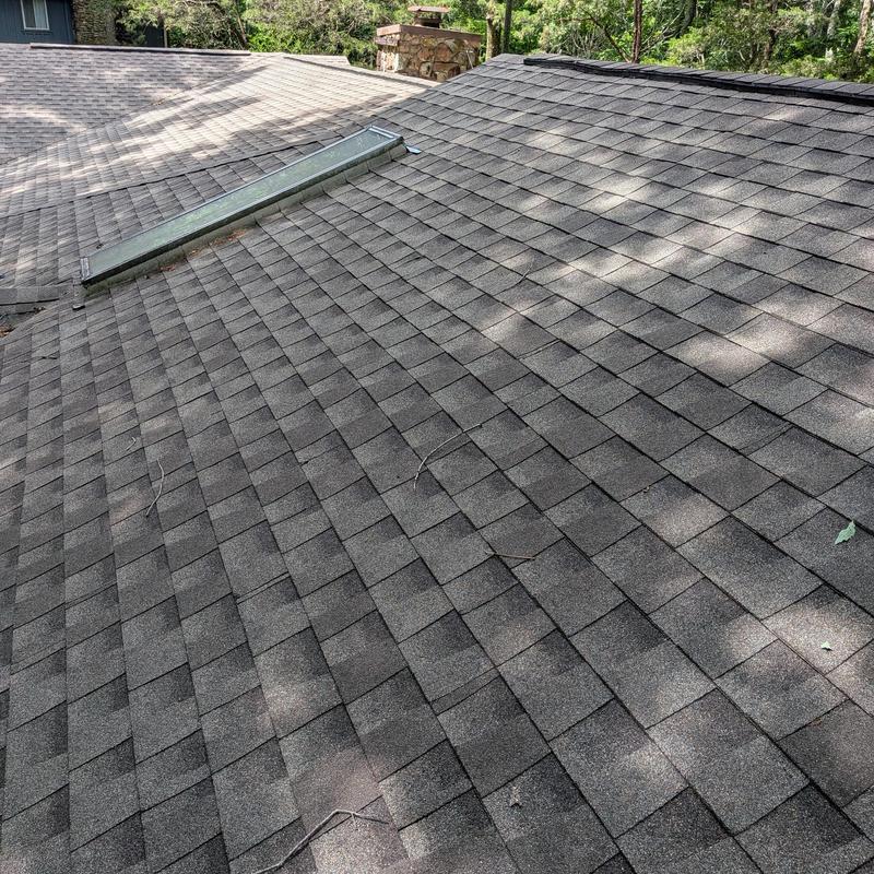 Skylight reflashing on asphalt shingle roof
