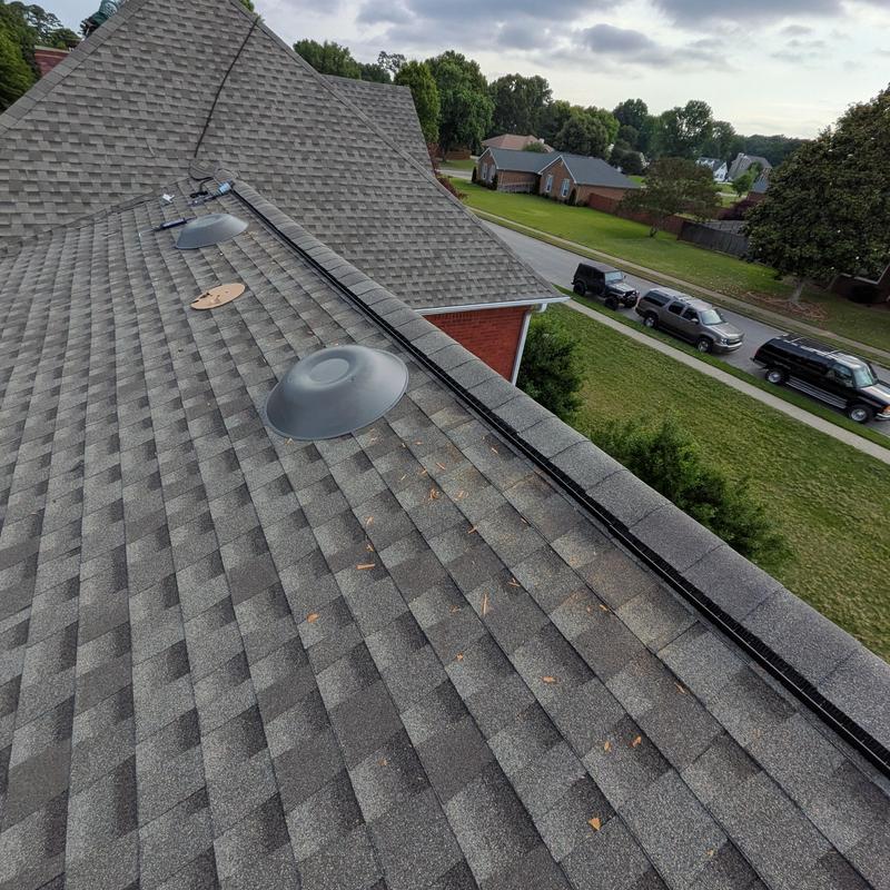 GAF asphalt shingle roof with ridge vents installation
