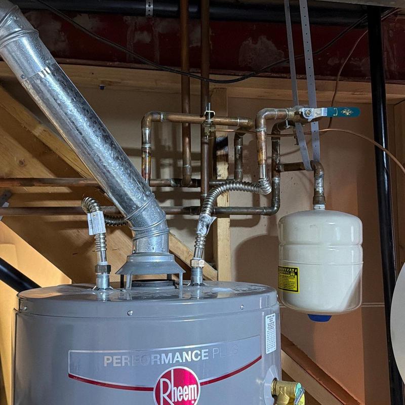 Water heater supply lines with new support brackets Water heater supply lines with new support brackets