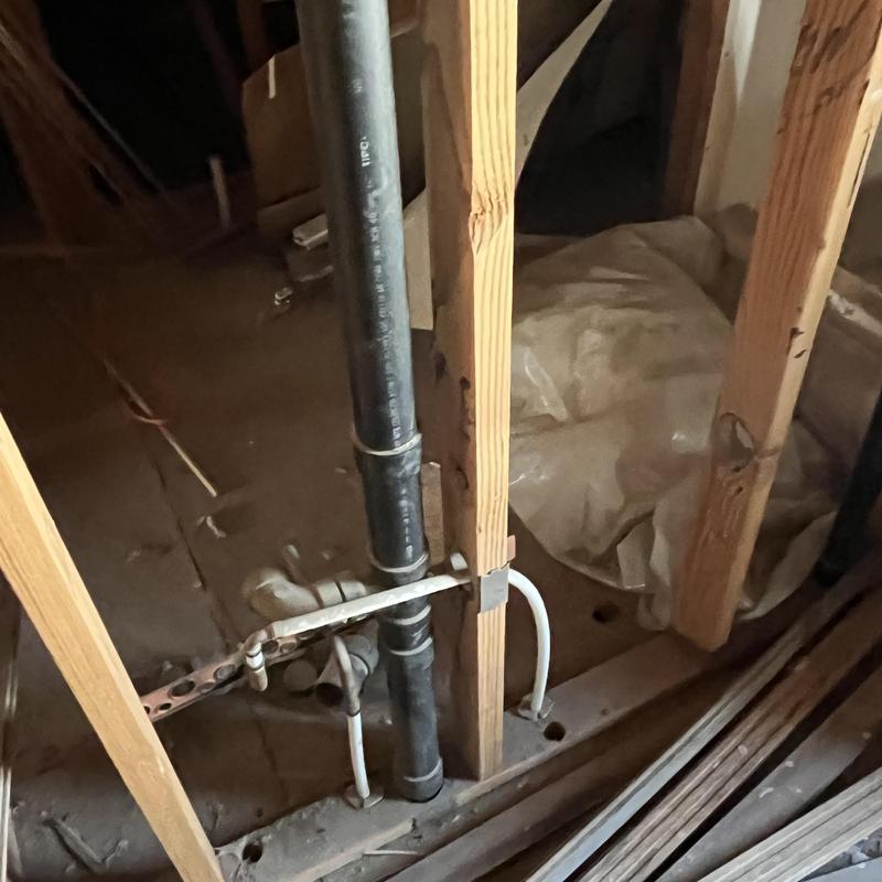 PVC drain and water supply rough-in in wall framing PVC drain and water supply rough-in in wall framing