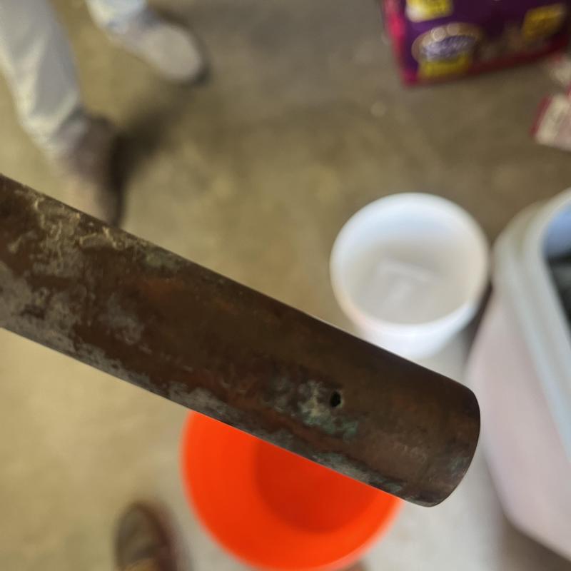 Copper watermain pipe with corrosion hole detail
