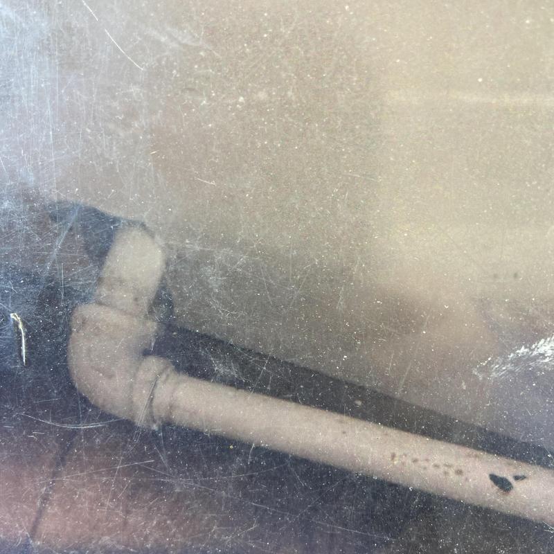 Gas line pipe with elbow joint in floor corner