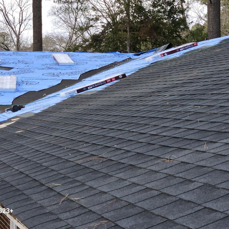 Asphalt shingle roofing with underlayment installation Asphalt shingle roofing with underlayment installation