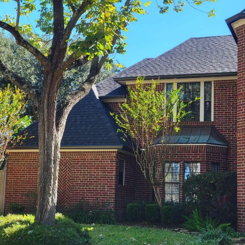 Tamko Titan XT Rustic black shingle roof with gutters Tamko Titan XT Rustic black shingle roof with gutters