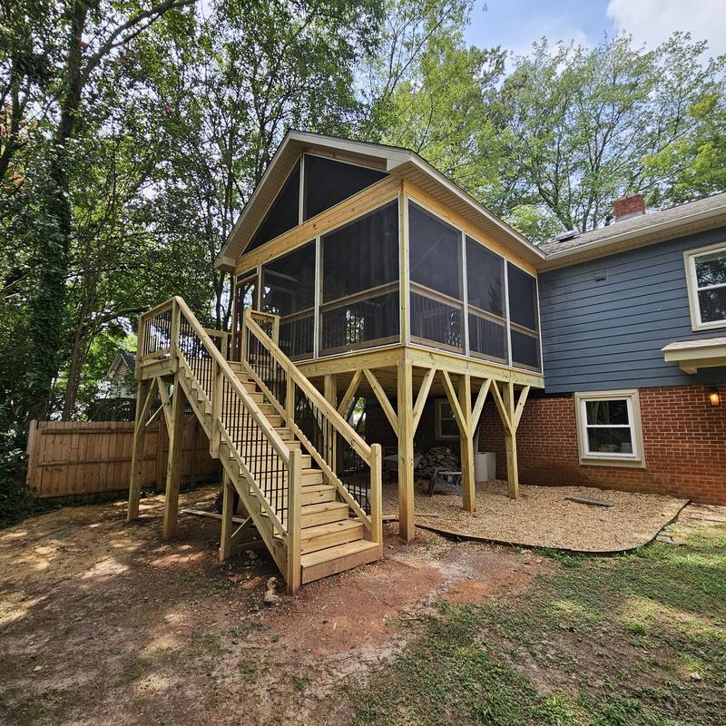 Screened porch with wood deck and stairs addition Screened porch with wood deck and stairs addition