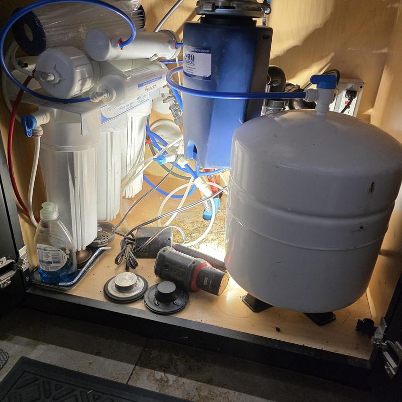 Reverse osmosis water filter system installation under sink Reverse osmosis water filter system installation under sink