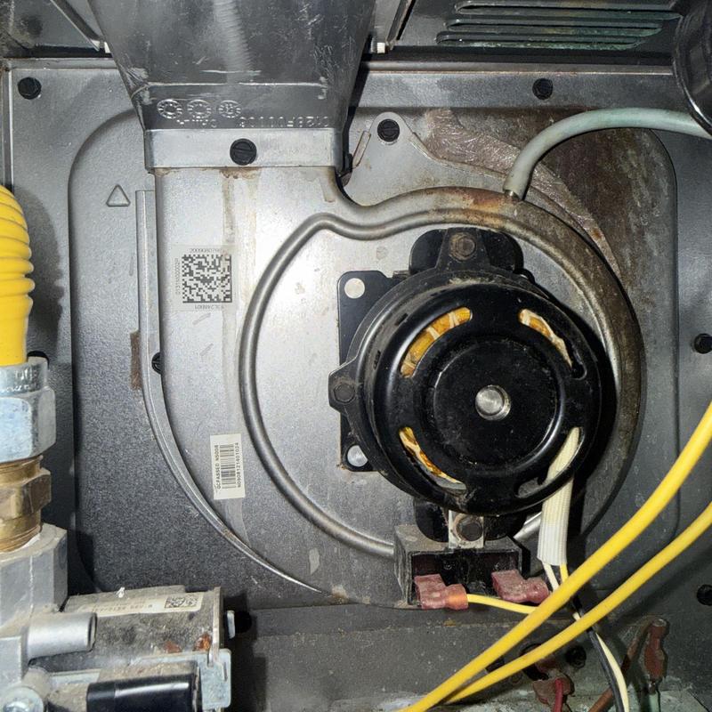 Furnace draft inducer motor with wiring and ducting Furnace draft inducer motor with wiring and ducting