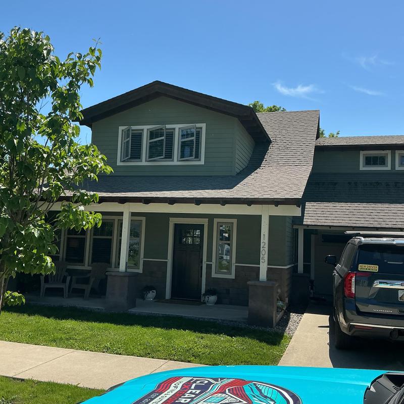 Gutter system inspection and measurement on house exterior Gutter system inspection and measurement on house exterior
