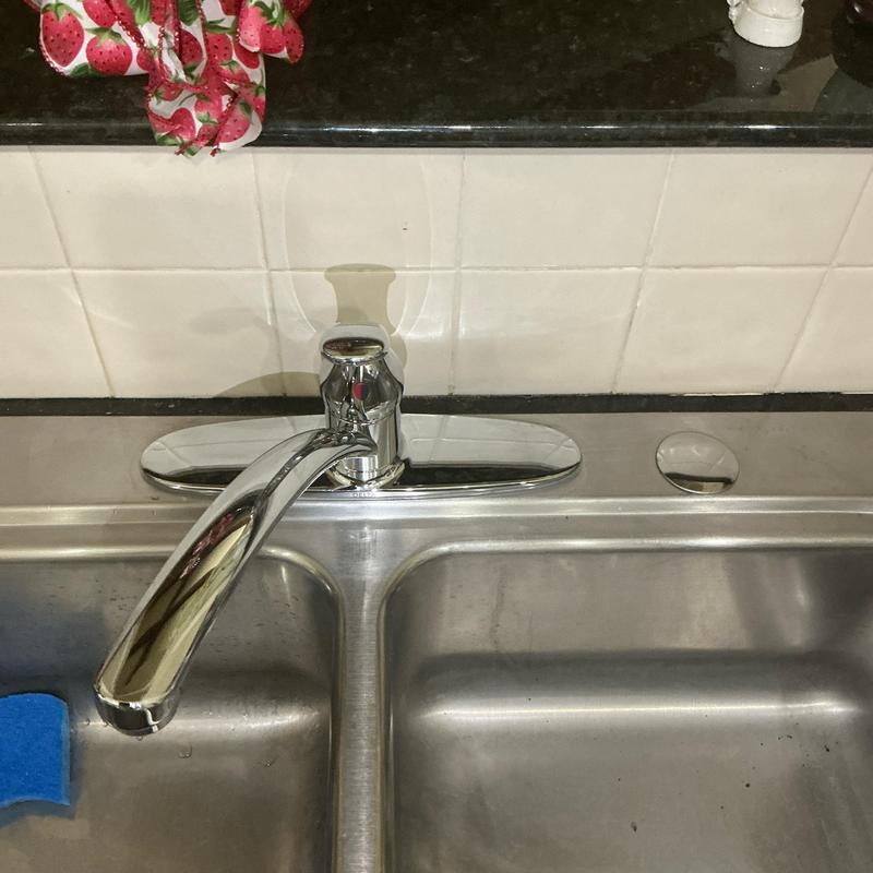 Kitchen sink faucet with single handle and hole cover installed