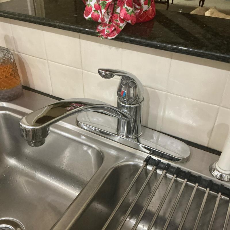 Kitchen faucet with single handle and hole cover installed