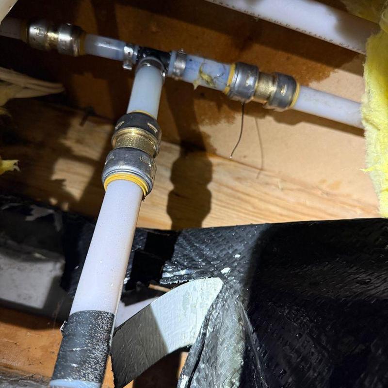 Pex piping with fittings and leak repair in crawlspace