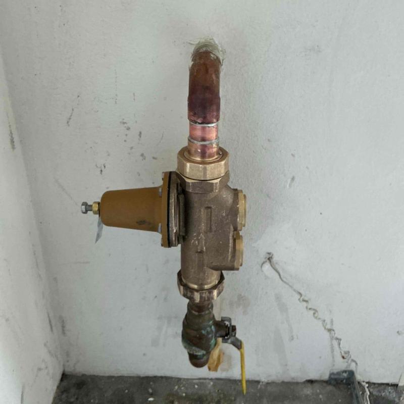 Double check pressure regulator assembly on copper piping