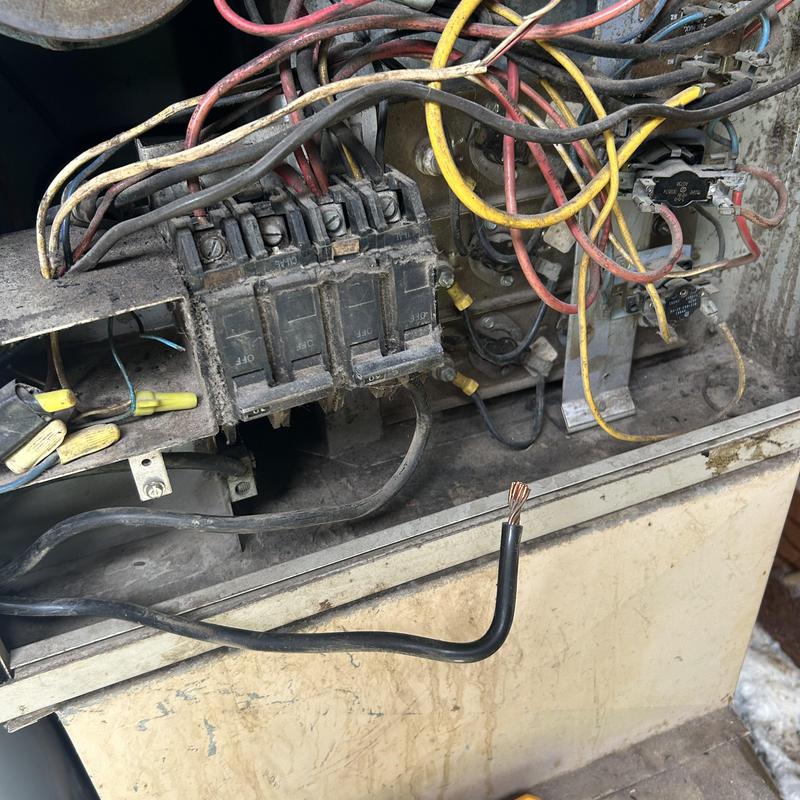 Subpanel wiring with corrosion and exposed wire ends