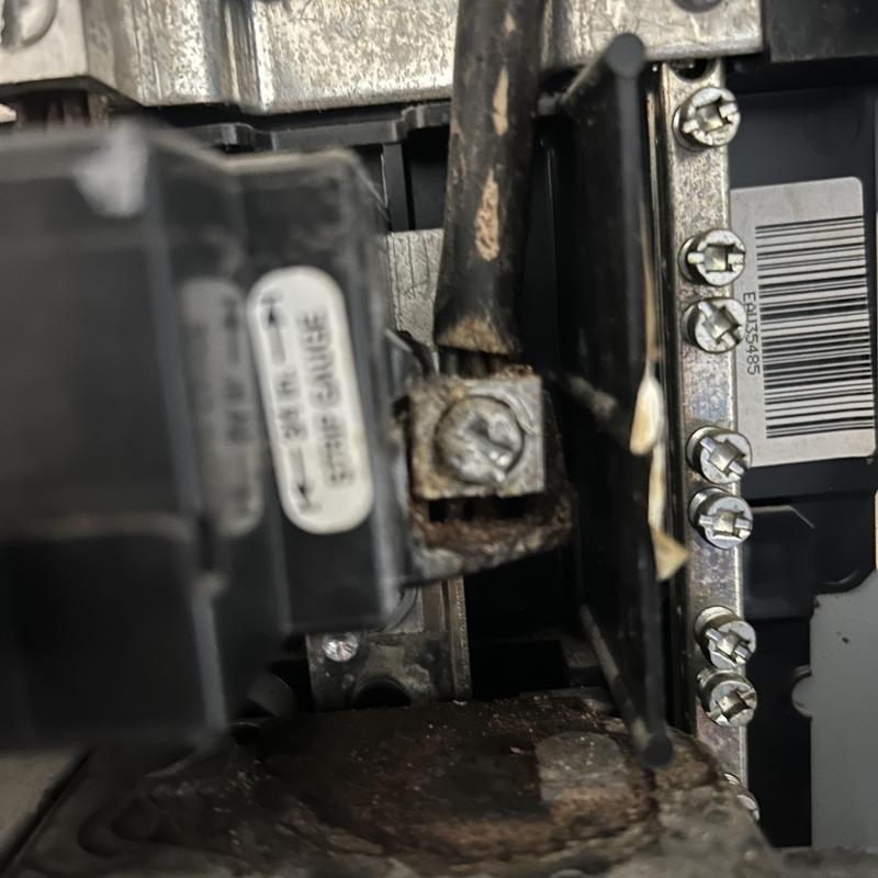 Corroded electrical subpanel connection close-up