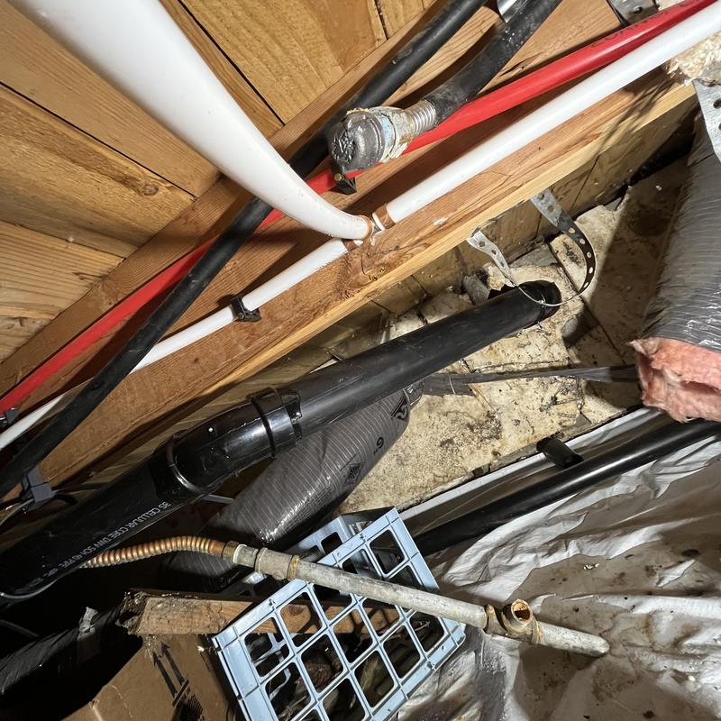 Kitchen sink drain pipe replacement in basement ceiling