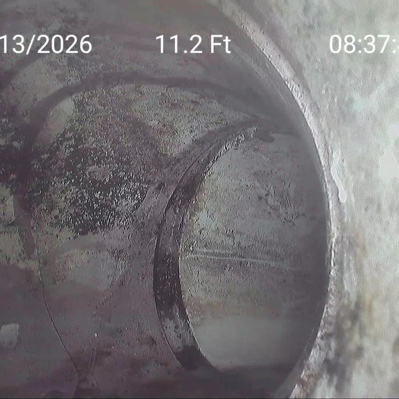 Sewer pipe interior with visible break at 11.2 feet