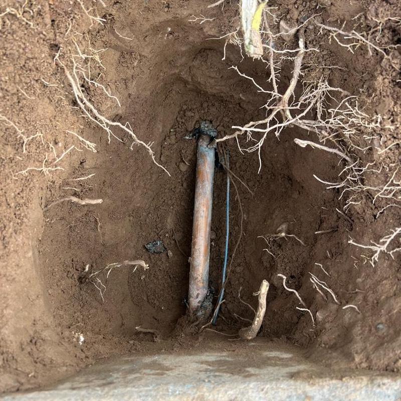 Main waterline exposed during valve installation hole Main waterline exposed during valve installation hole