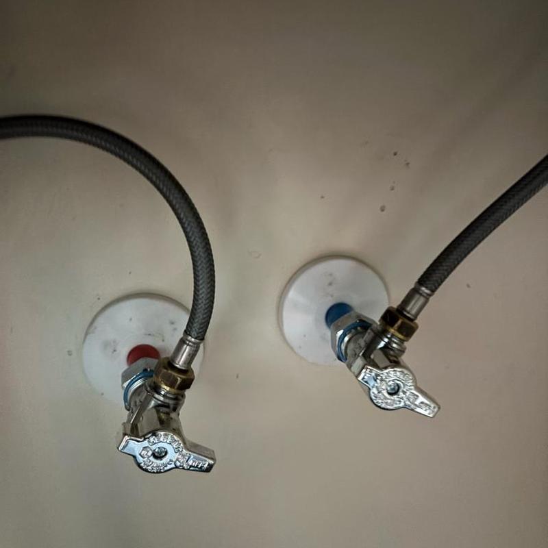 Angle stop valves with braided supply lines installed Angle stop valves with braided supply lines installed