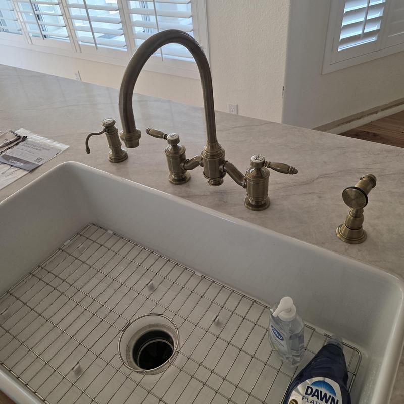 Kitchen faucet with sprayer and soap dispenser installed Kitchen faucet with sprayer and soap dispenser installed