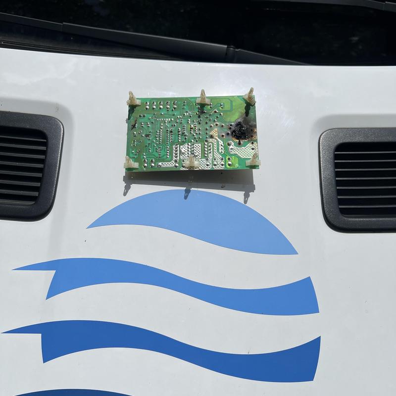 Control board with burn damage from lizard short circuit Control board with burn damage from lizard short circuit