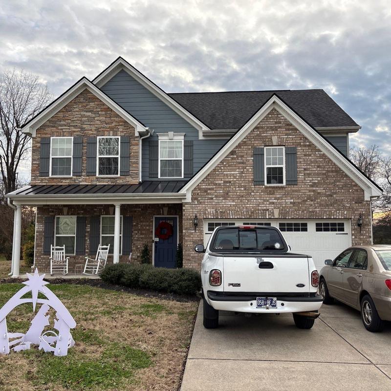 Asphalt shingle roof with hail damage inspection