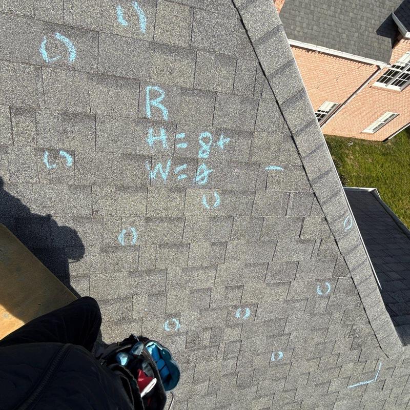 Shingle roof with hail damage markings and notes