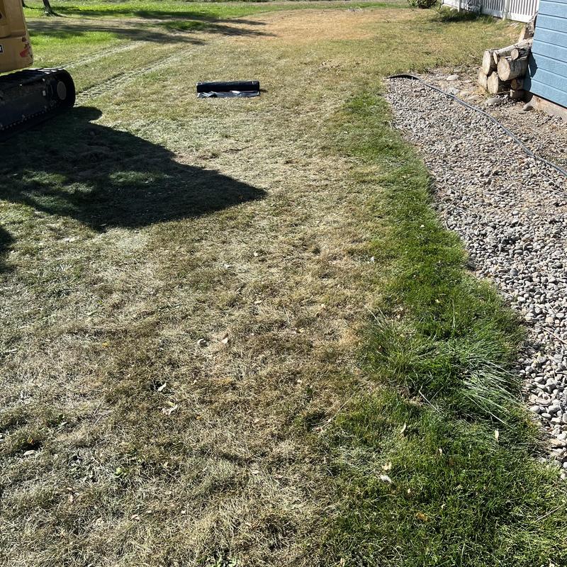 Septic drain field test excavation site on lawn
