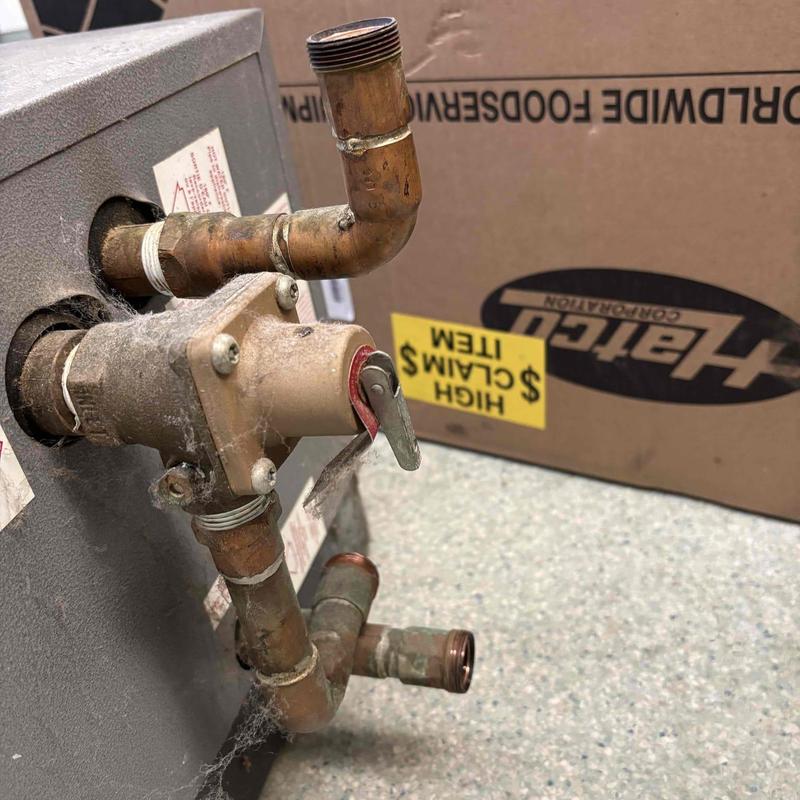 Booster water heater valve and copper piping installation