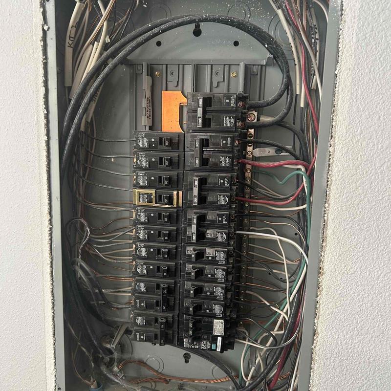 Electrical breaker panel with wiring and circuits