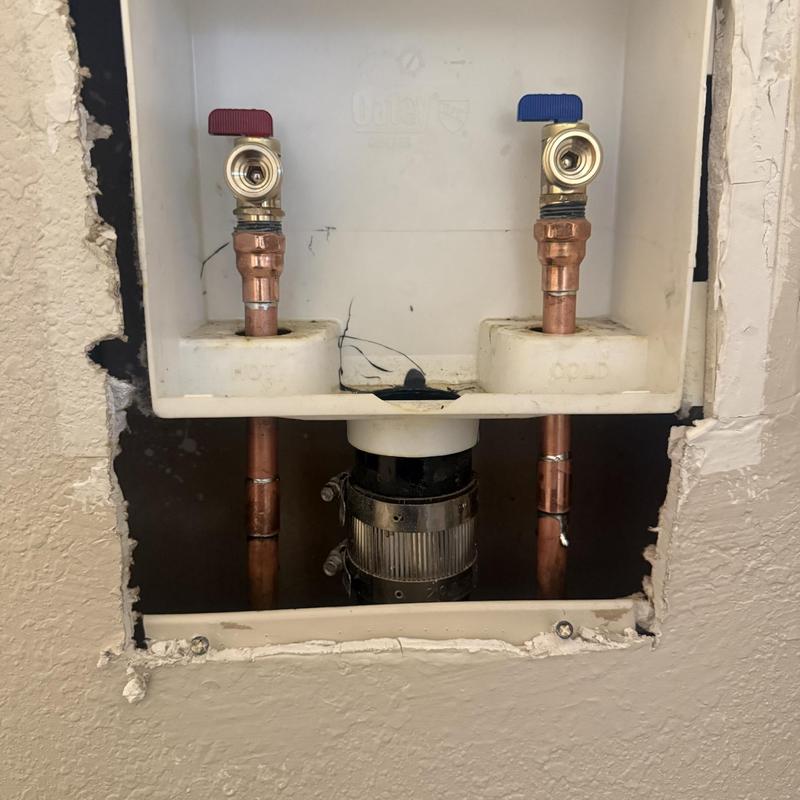 Laundry valves with quarter turn angle stops installed
