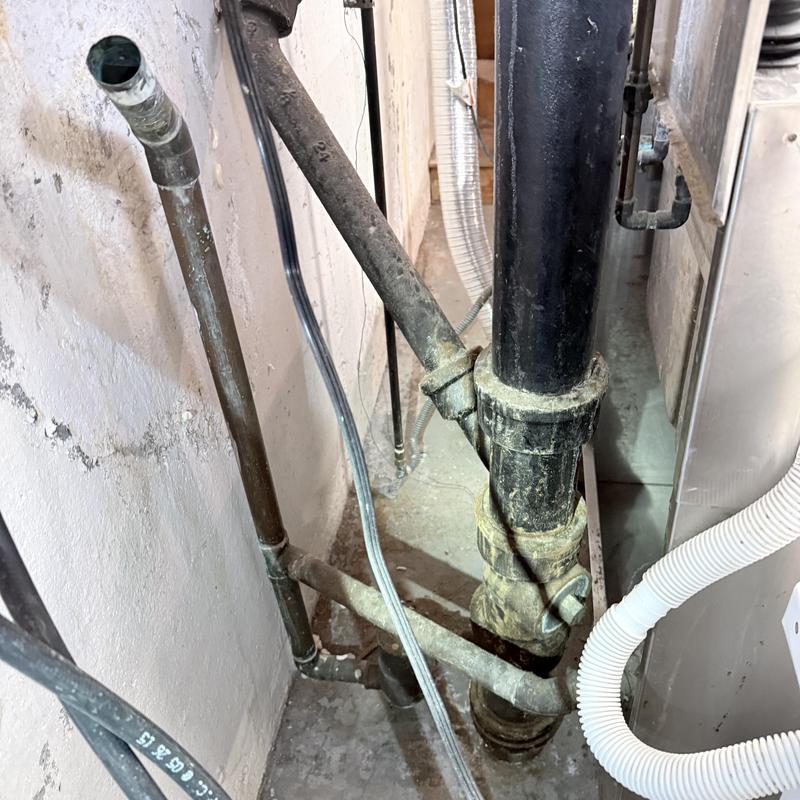 Laundry and slop sink drain pipes with trap replacement