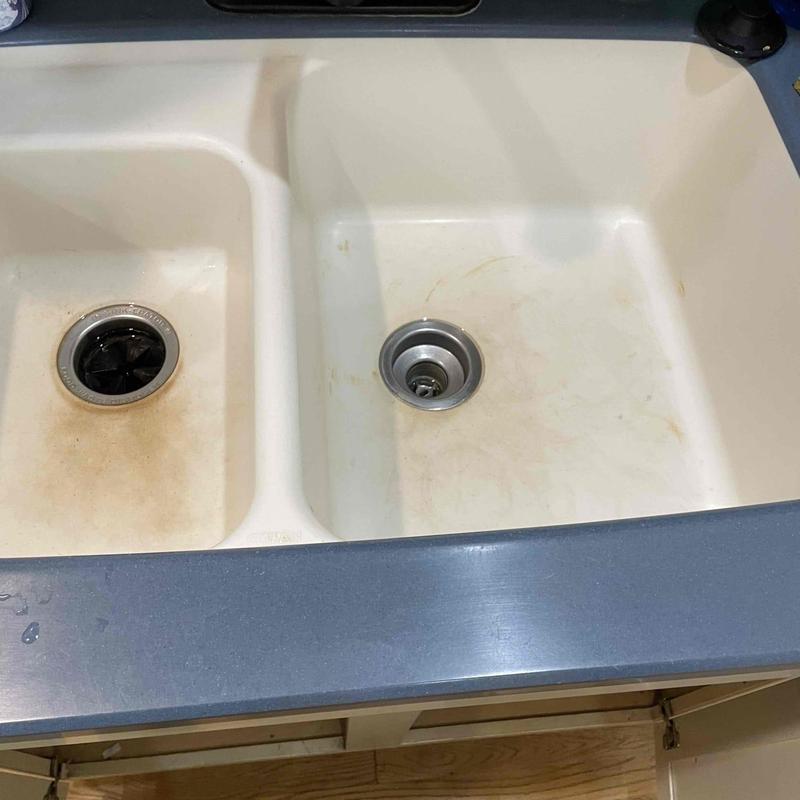 Kitchen sink drain with dual basin and clogs removed