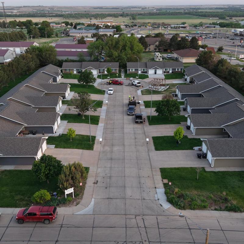 Roof shingles and gutters on multi-family homes