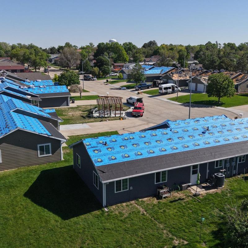 Roofs with blue underlayment on multi-family homes