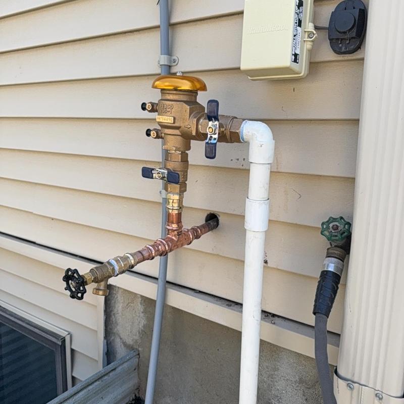 Irrigation vacuum breaker and outdoor piping connections Irrigation vacuum breaker and outdoor piping connections