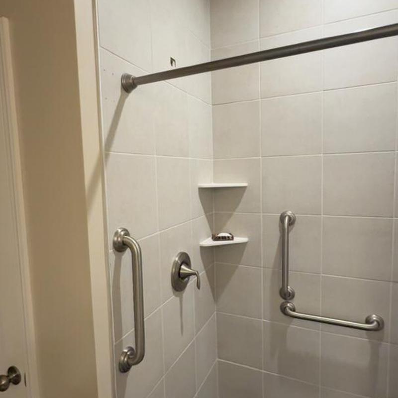 Hydro rail and grab bars installed in shower